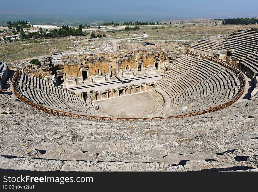 Ruins of theater in ancient Hierapolis, now Pamukkale, Turkey. Ruins of theater in ancient Hierapolis, now Pamukkale, Turkey