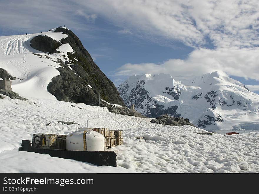 Scenery in Antarctica, the frozen continent, abandoned container and boxes. Scenery in Antarctica, the frozen continent, abandoned container and boxes