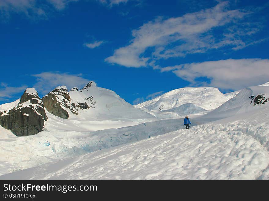 Antarctic scenery, snow and blue sky and walker