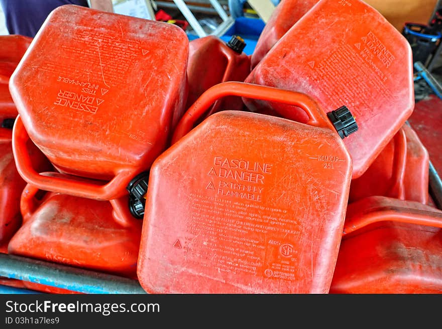 Photo of Improperly keep Red Gasoline Can with safety reminder