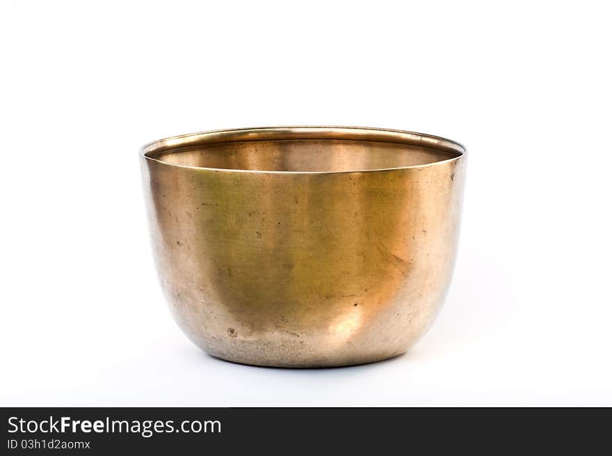 Old Brass bowl of water on white background,phitsanulok. Old Brass bowl of water on white background,phitsanulok