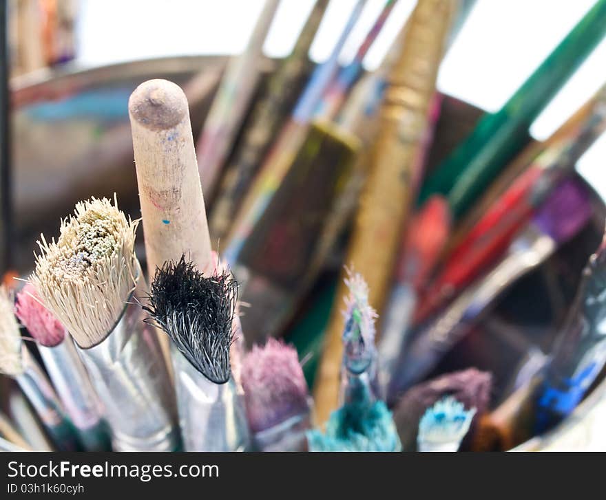 Brushes in the bucket, close up