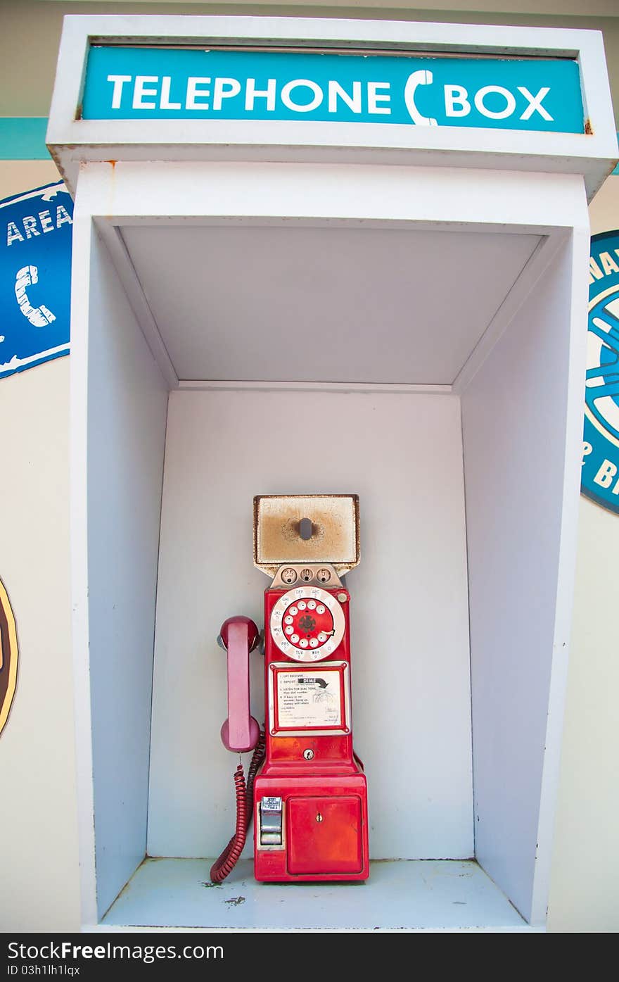 Red public telephone in box