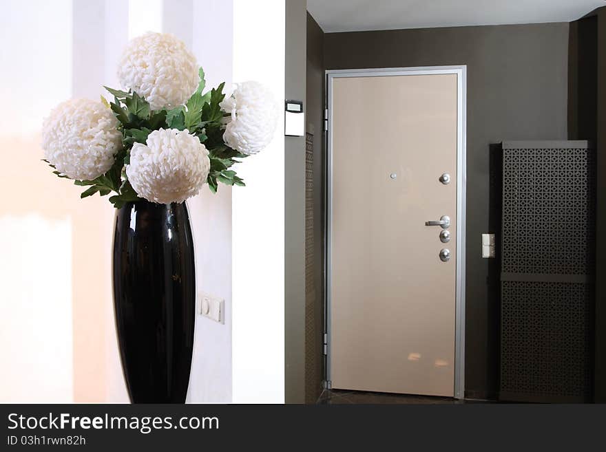 Spacious modern lobby with the big mirror and a bench from a skin