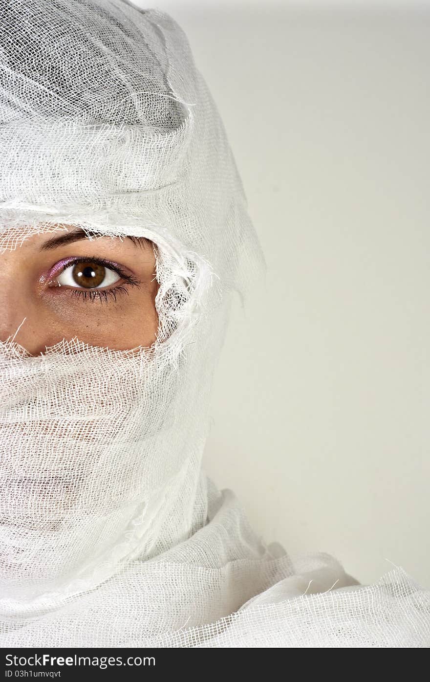 Girl after accident against white isolated background