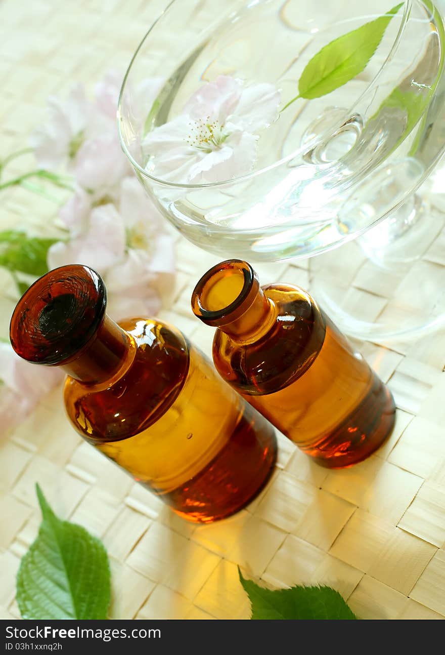 Beautiful spa composition of bottles and flowers