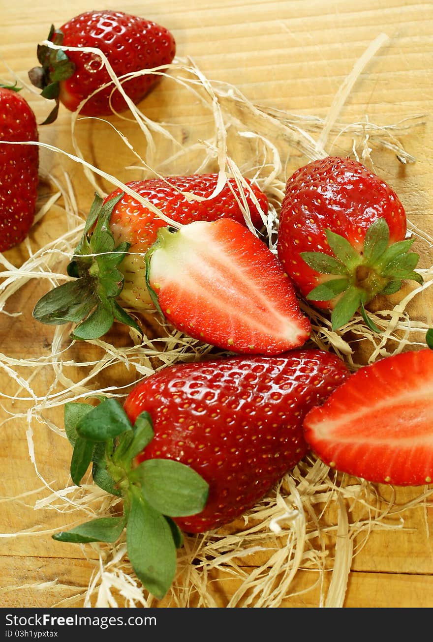 Fresh strawberry on wooden board