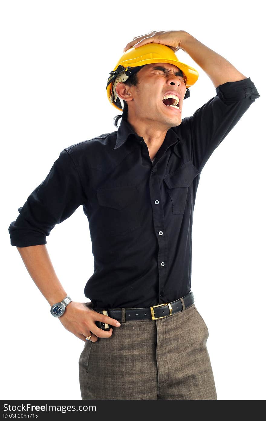 Depressed workers shouts isolated white background.His left hand on the head and his right hand on his waist