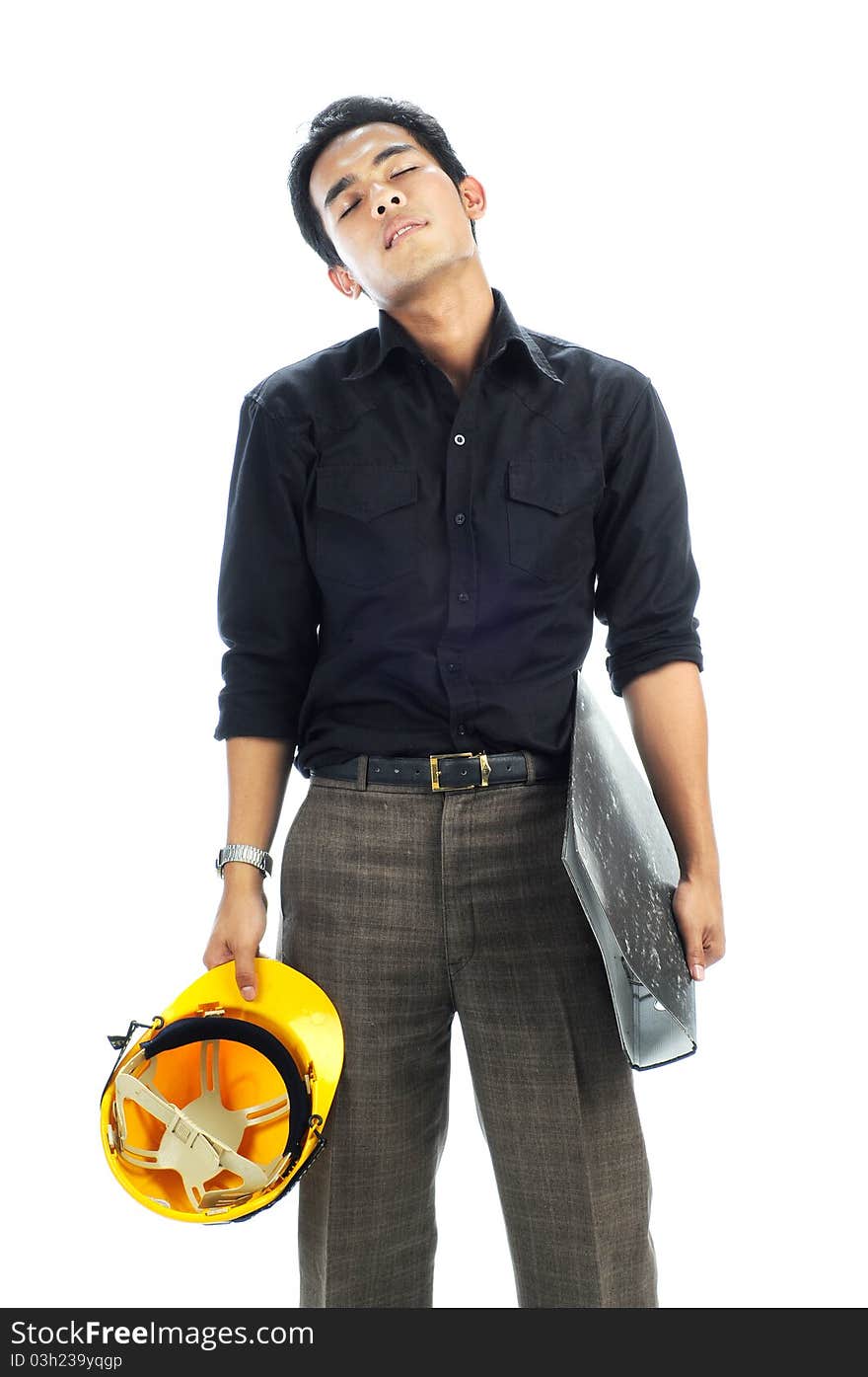 Tired worker standing and holding safety helmet and files isolated white background