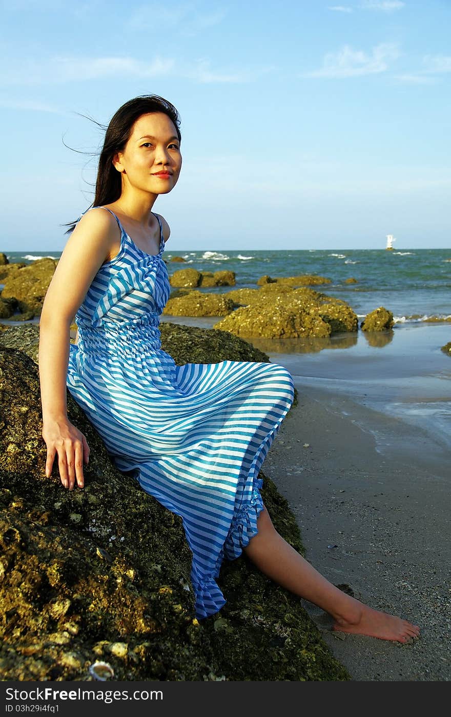 Young Woman On The Beach