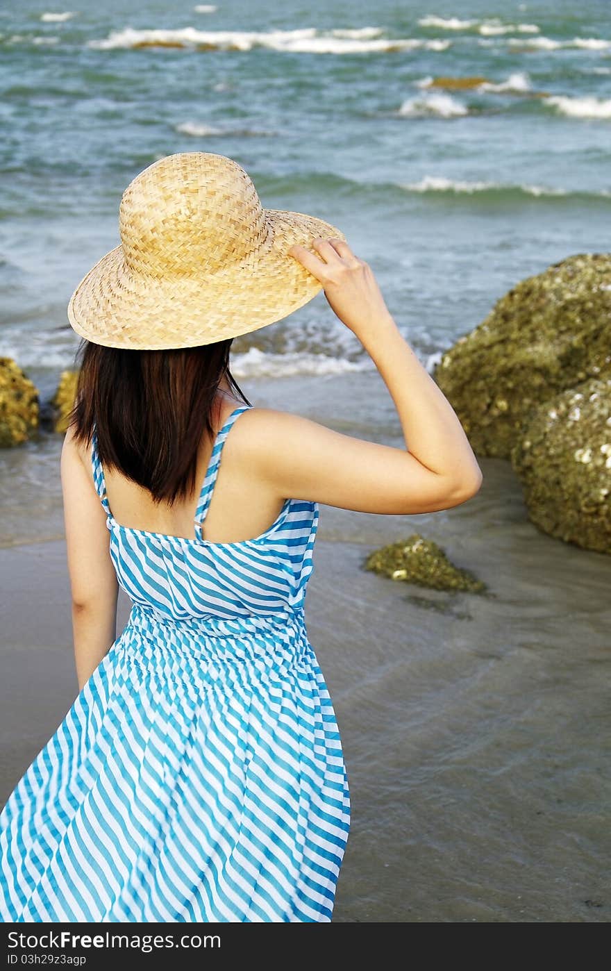 Portrait of young woman on the beach