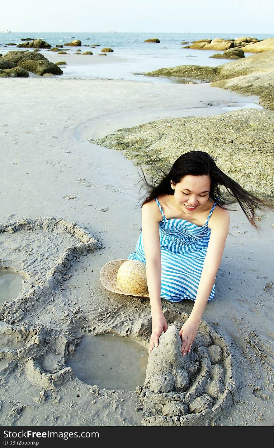 Young Woman On The Beach