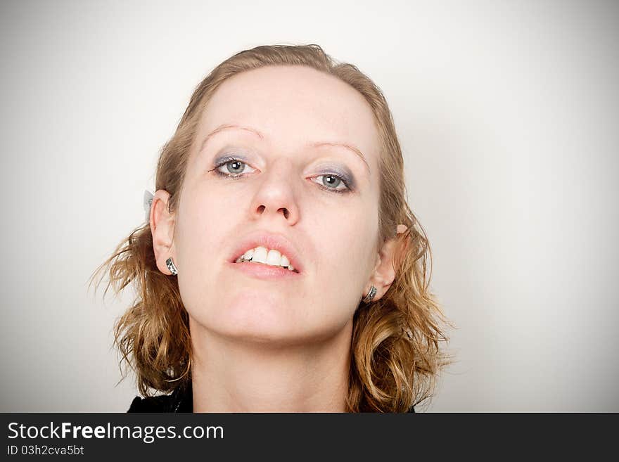 Portrait of young woman looking really tired and exhausted