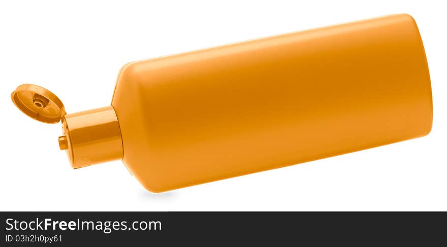 Orange shampoo bottle. Isolated on white background