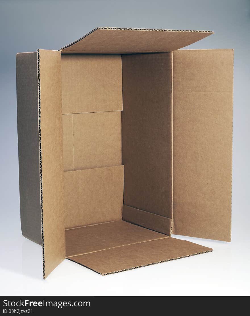 Brown, open cardboard box for design layout