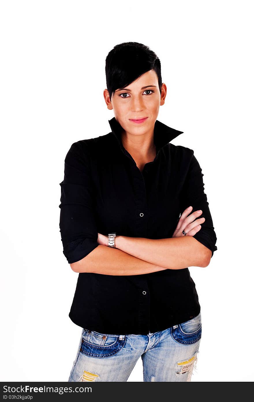 Beautiful short haired young Caucasian woman in blue jeans, over white background