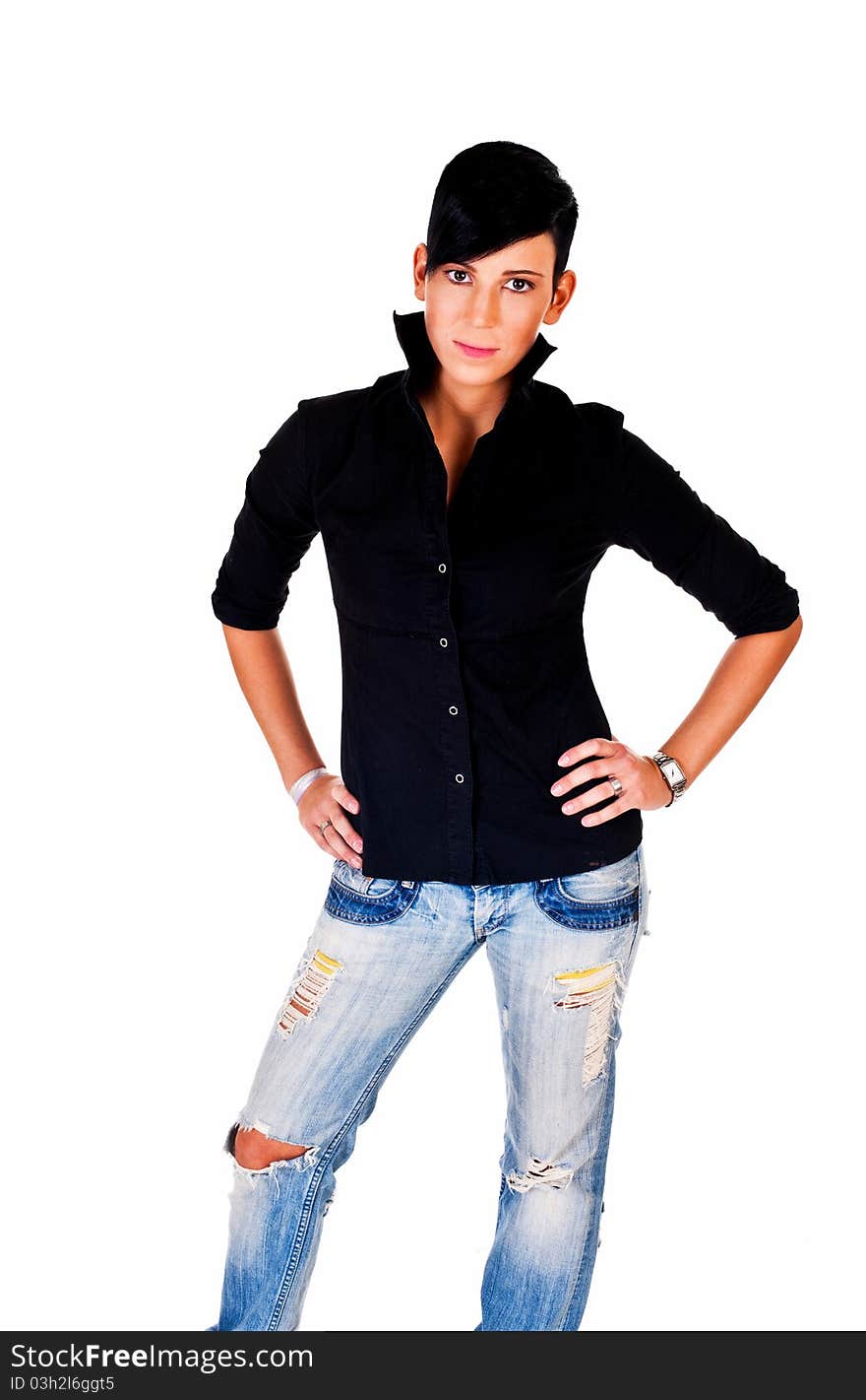 Beautiful short haired young Caucasian woman in blue jeans, over white background