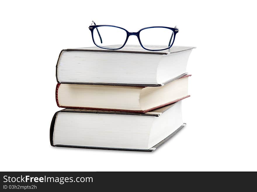 Book stack with eye glasses. Book stack with eye glasses