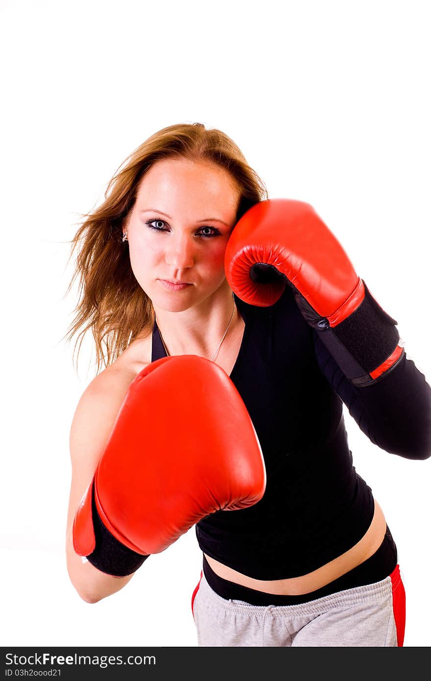 Attractive Caucasian girl practicing boxing