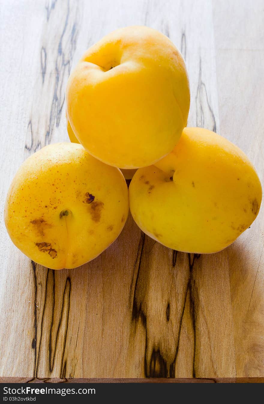 Apricots on wood table