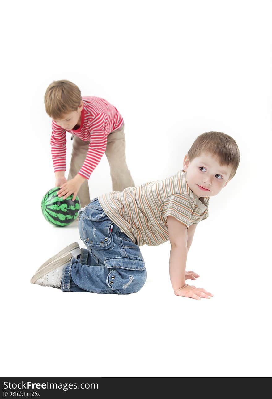 Two boys playing over white. Two boys playing over white