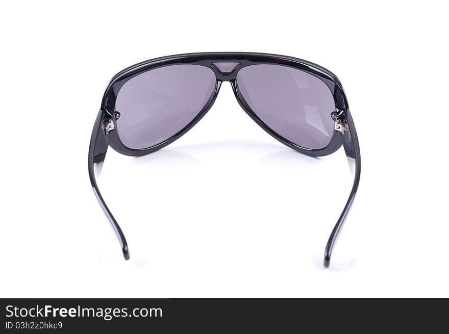 Sunglasses with black frame on white background