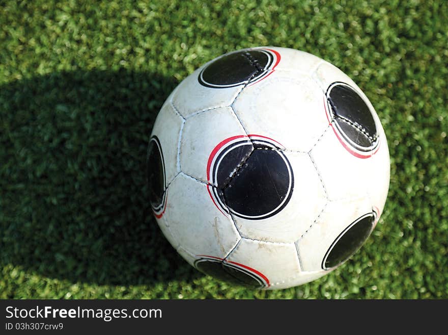 Photo of soccer ball on grass. Photo of soccer ball on grass