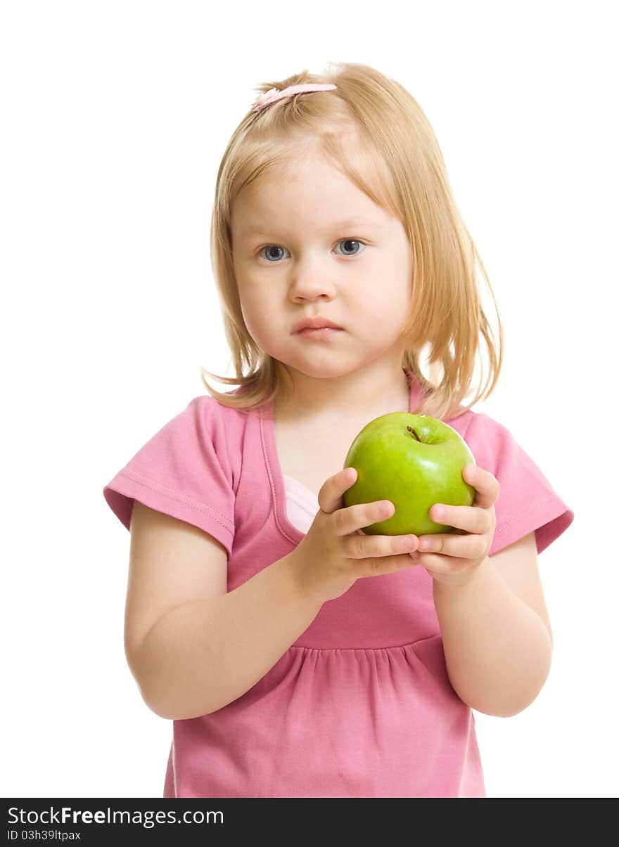 Little girl portrait eating green apple isolated on white