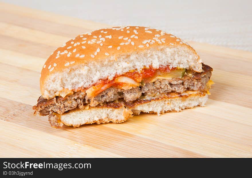 Delicious hamburger with lots of cheddar