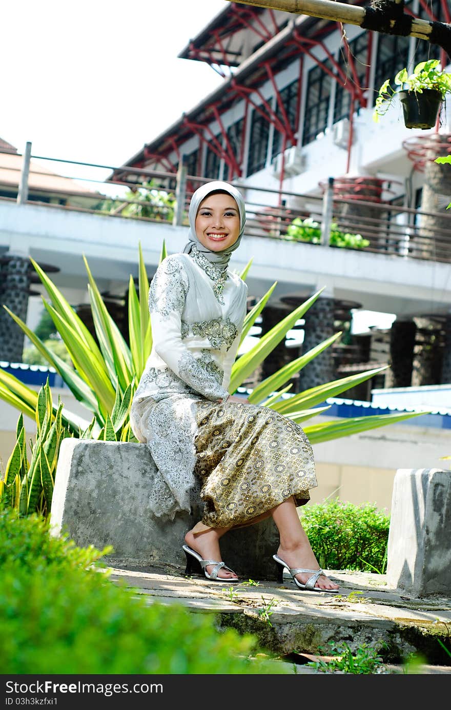 A beautiful young girl wearing muslim clothing. A beautiful young girl wearing muslim clothing