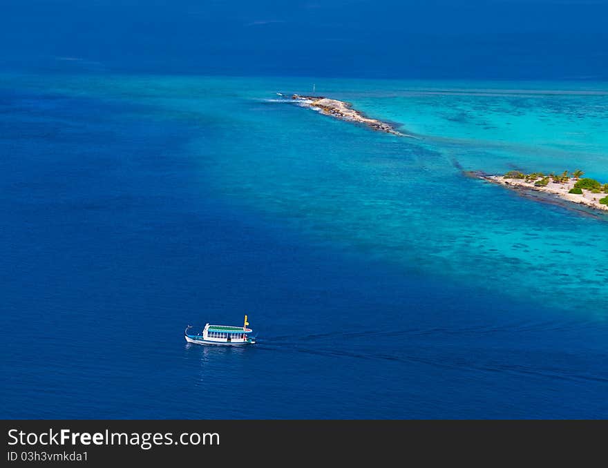 Tropical island at Maldives - aerial view