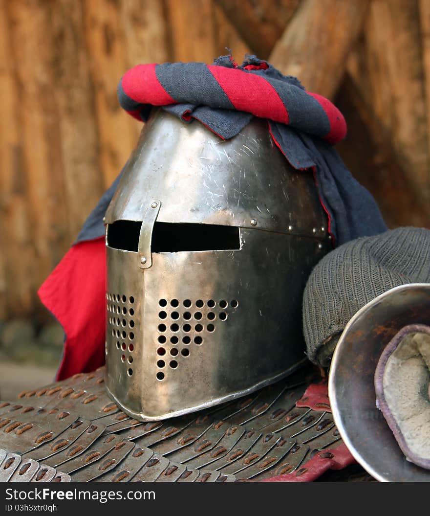 Protective metal helmet. Close up of a medieval armour. Protective metal helmet. Close up of a medieval armour.