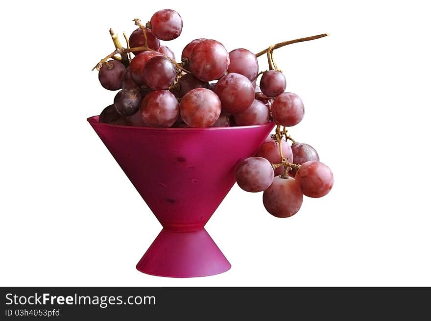 Grape branch in a vase on the white isolated background