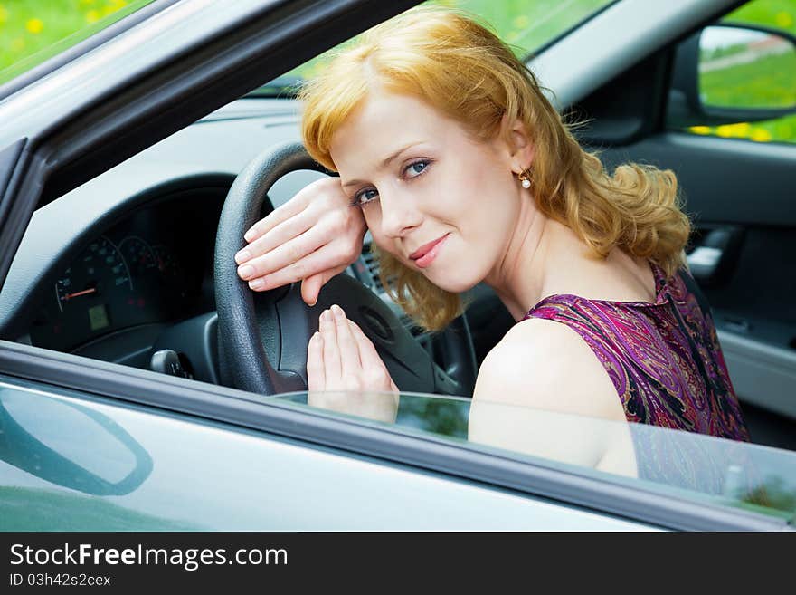 A woman behind the wheel