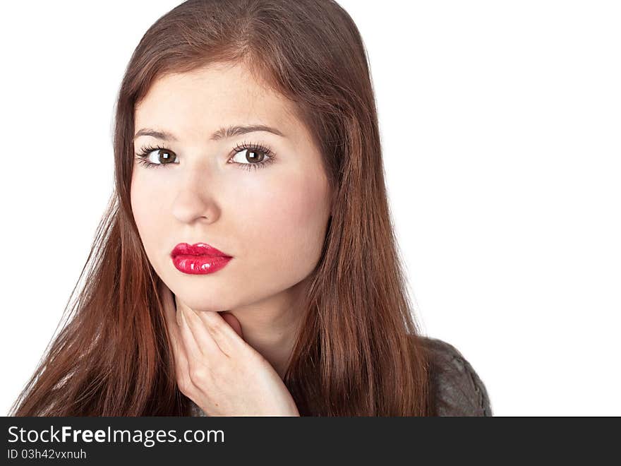 A beautiful young woman with red lips. Isolated on a white background