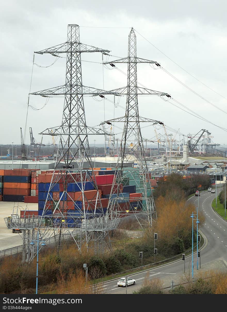 electricity pylons in a busy city