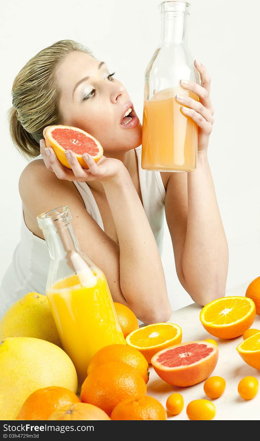 Woman With Citrus Fruit