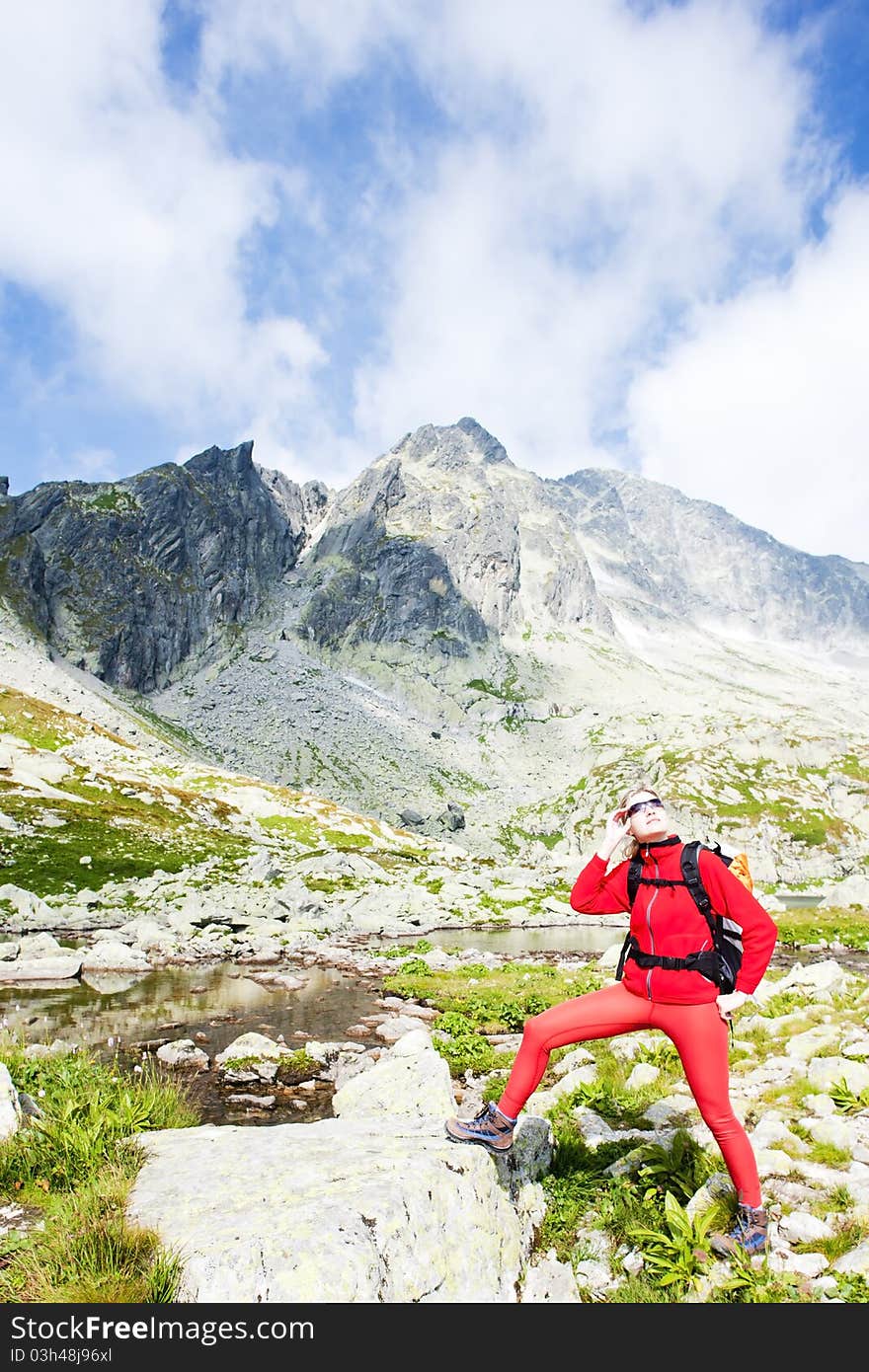 Woman backpacker at Five Spis Tarns, Vysoke Tatry (High Tatras), Slovakia