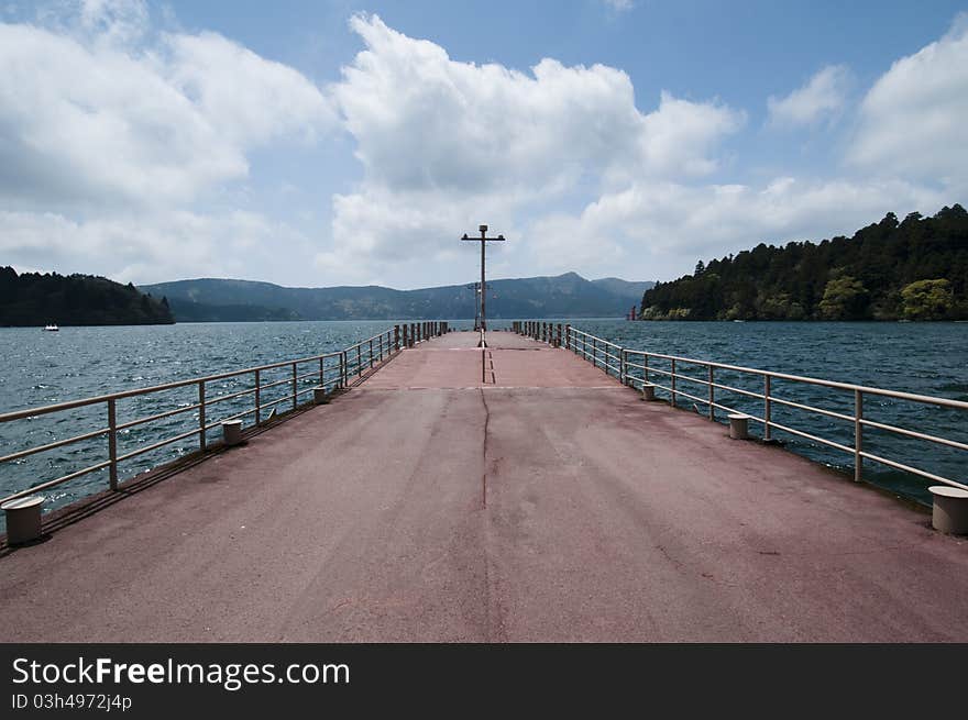 View over pier and river Ashi in Hakone, Japan. View over pier and river Ashi in Hakone, Japan.