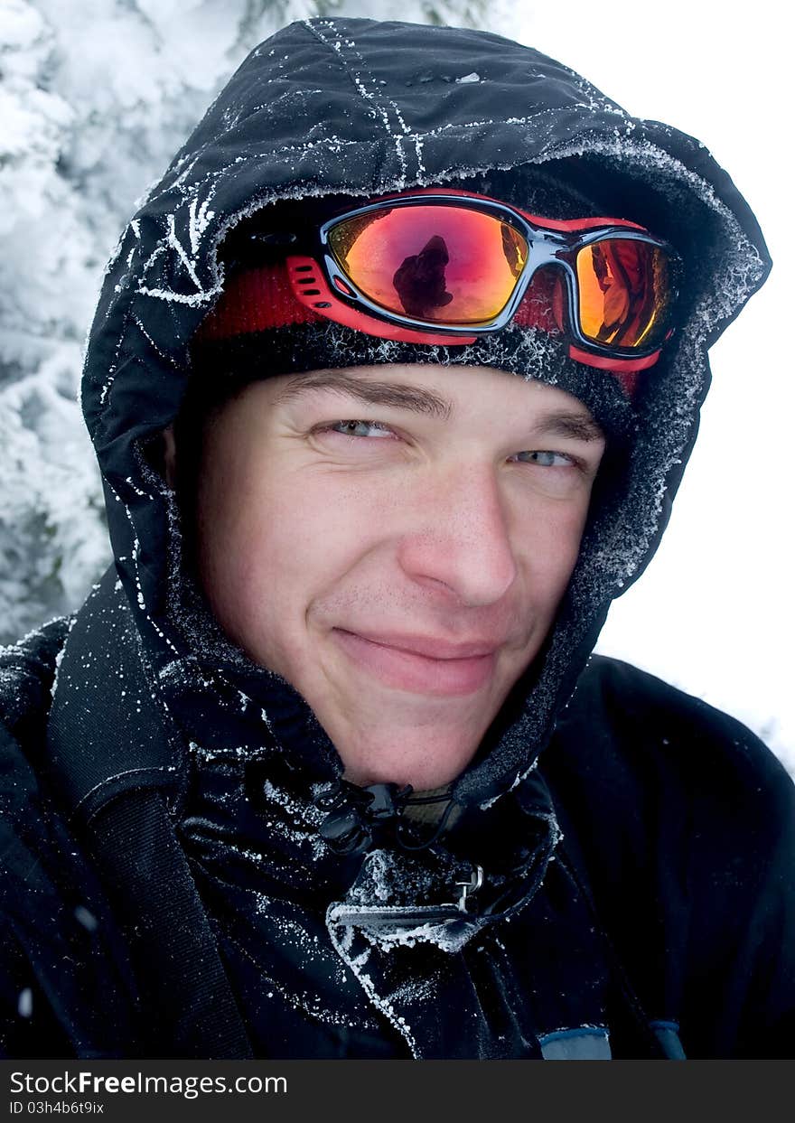 Hiker at the mountains covered with snow