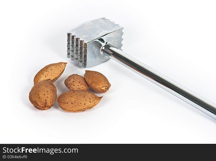 Almond nut and hammer