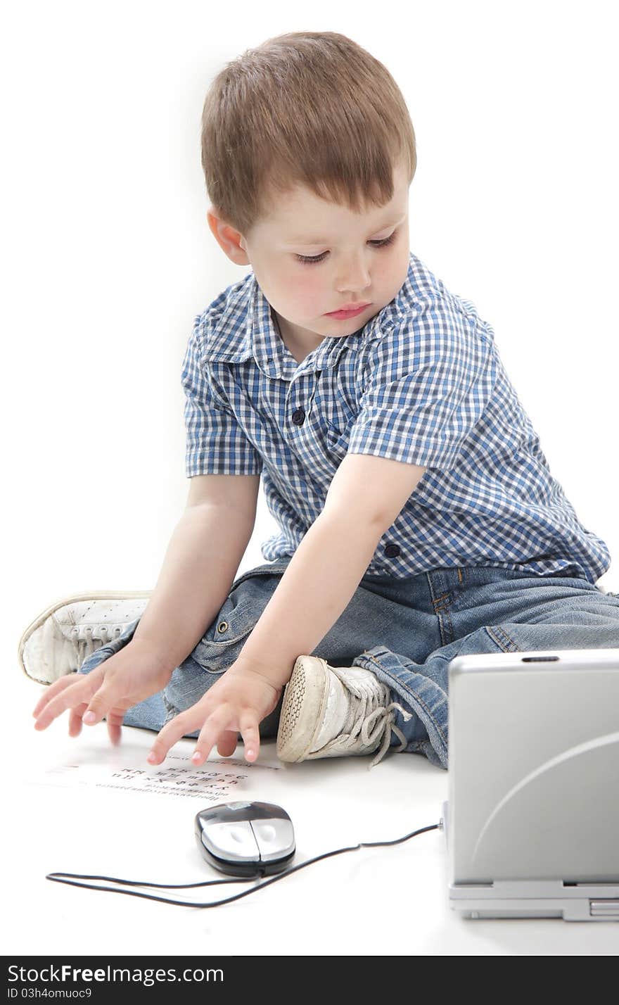 Young Boy With Laptop Over White