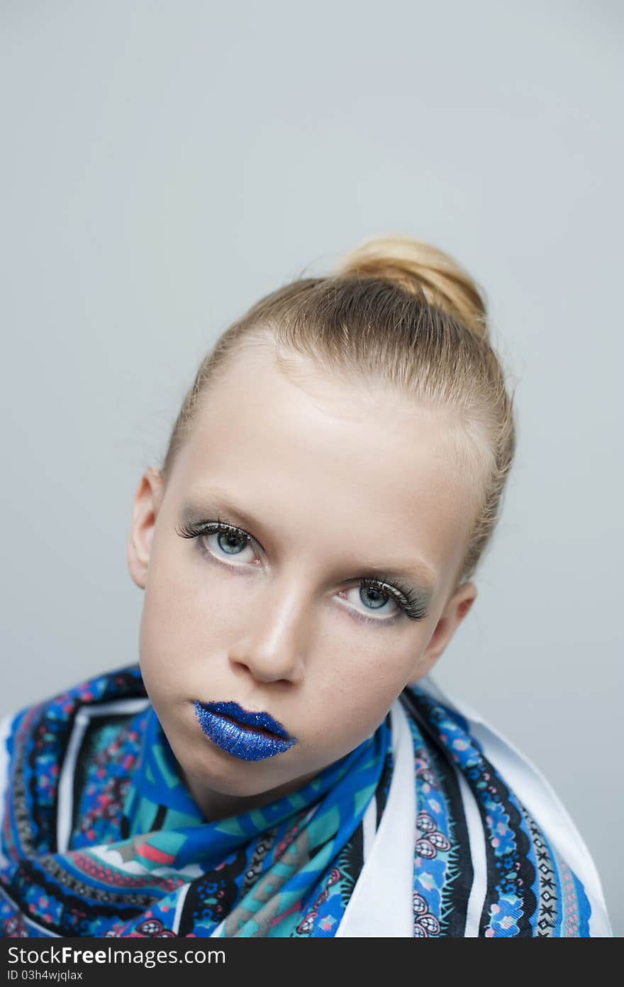 Facial closeup portrait of a teenage girl.