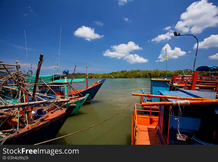 Scene of fishing boats at a port in Thailand