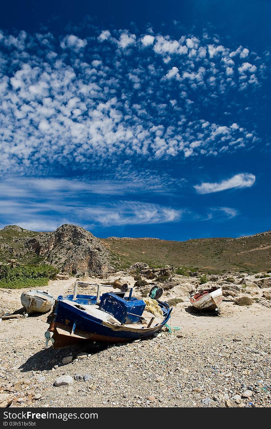 Rusty old boat on the shore in Greece island Crete