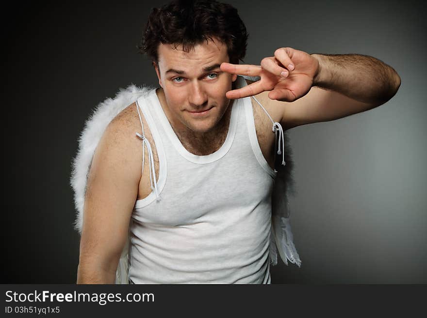 Mr. Angel with white wings. Crazy character portrait. Mr. Angel with white wings. Crazy character portrait.