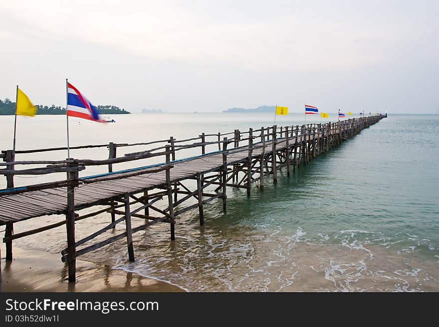 Wooden walk way to sea port south of Thailand