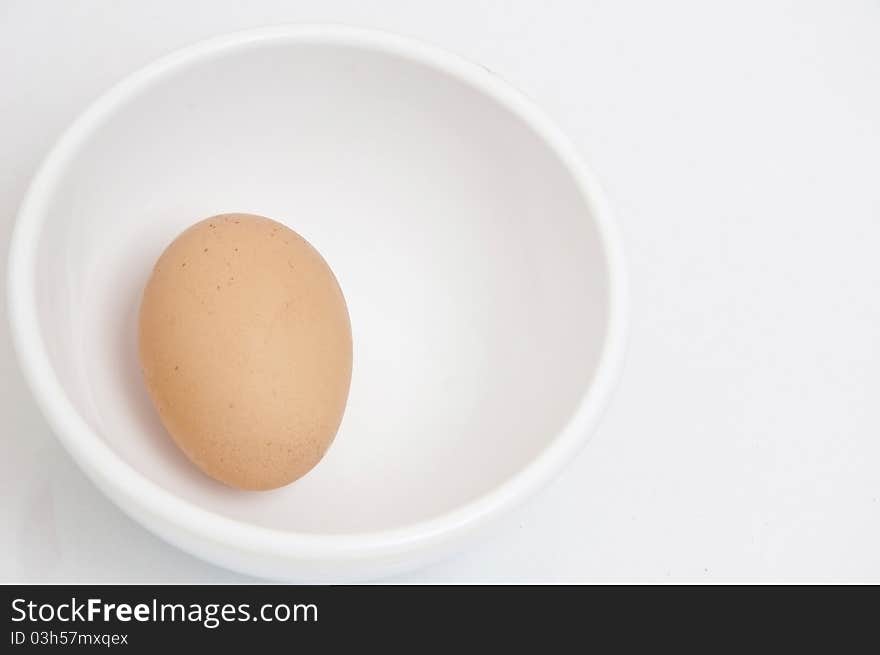 Egg in cup as isolate background