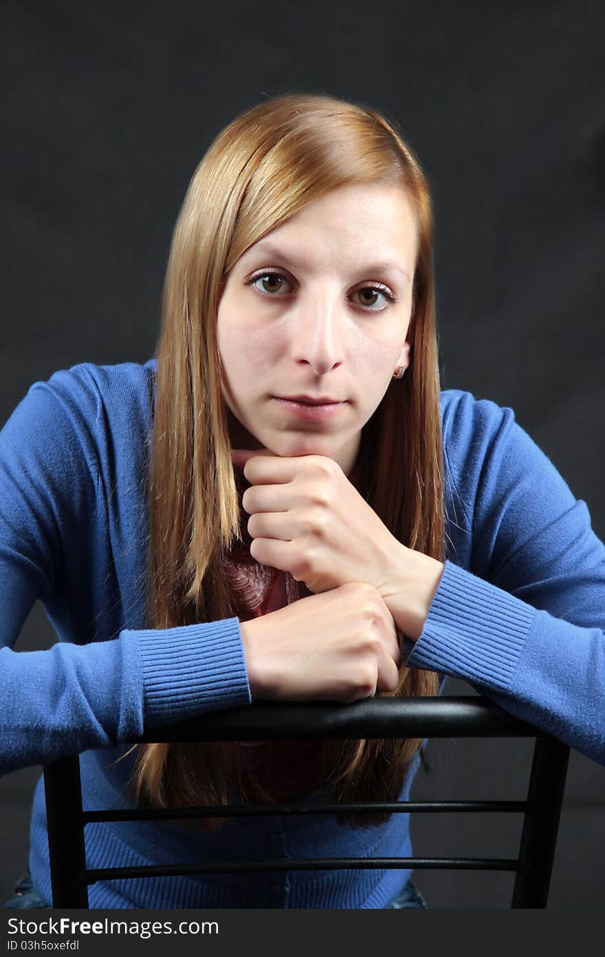 Portrait of the girl on a black background