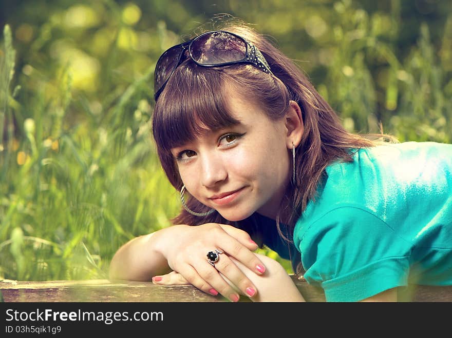 Cute young teen at the spring season park. Cute young teen at the spring season park